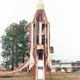 Image for article titled The haunting beauty of abandoned playground rockets